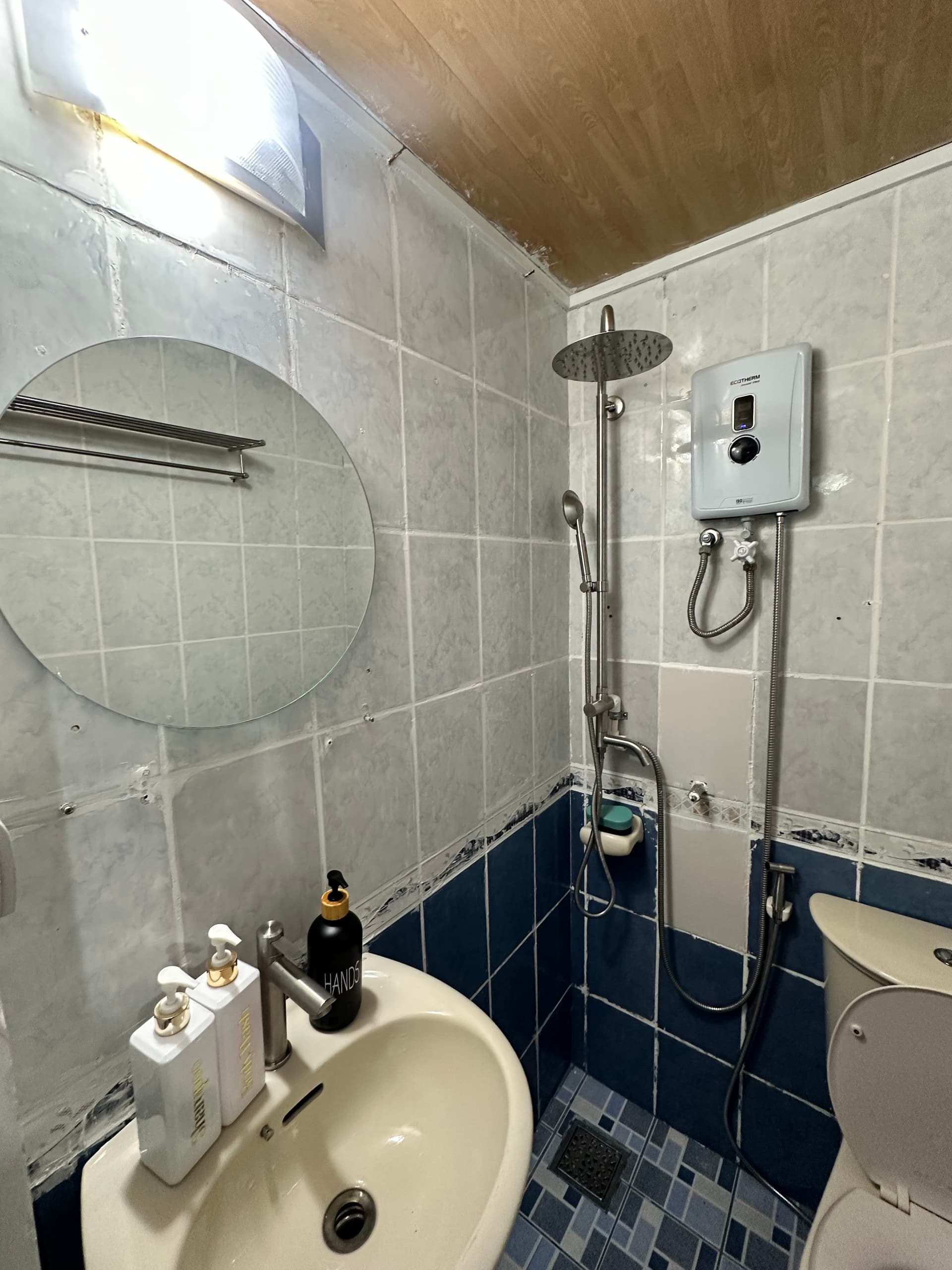 Private bathroom with hot rain shower